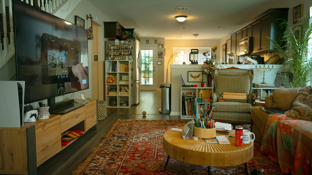 TV remote on a couch — comparing best IPTV players for Android TV in 2026