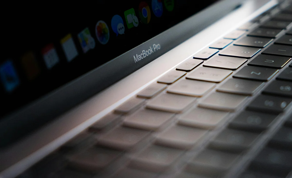 Laptop on a home desk — setting up an M3U IPTV playlist on Mac